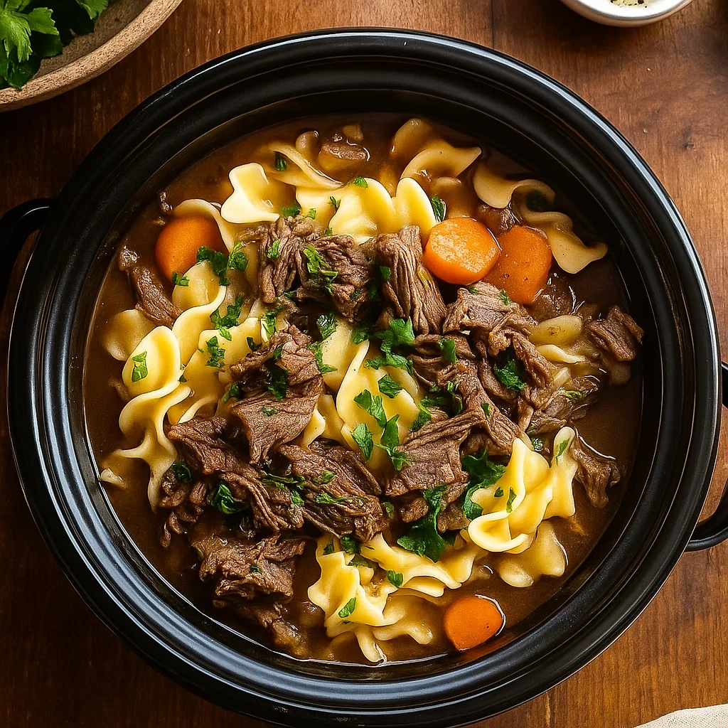 Crockpot Beef and Noodles in a rustic kitchen setting