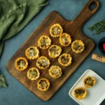 Mushroom Tartlets appetizer on wooden table