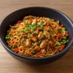 Chicken Ramen Stir Fry in bowl with vegetables and noodles
