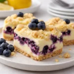 Blueberry Lemon Pie Bars fresh dessert on wooden table