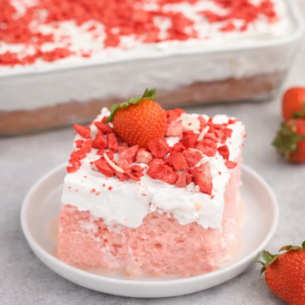 Strawberry Tres Leches Cake slice on plate