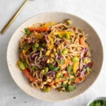 Thai Noodle Salad with colorful vegetables and peanut sauce