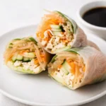 Chicken Spring Rolls on platter with dipping sauce