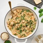 One Pot Chicken Orzo in a skillet with creamy sauce and veggies