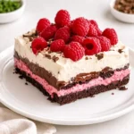 Raspberry Chocolate Lasagna Dessert slice with fresh raspberries