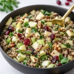 Quinoa Apple Salad with fresh apples and walnuts in a bowl